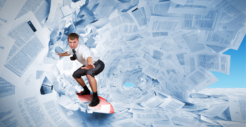Illustration showing a businessman riding the wave of manufacturing document management